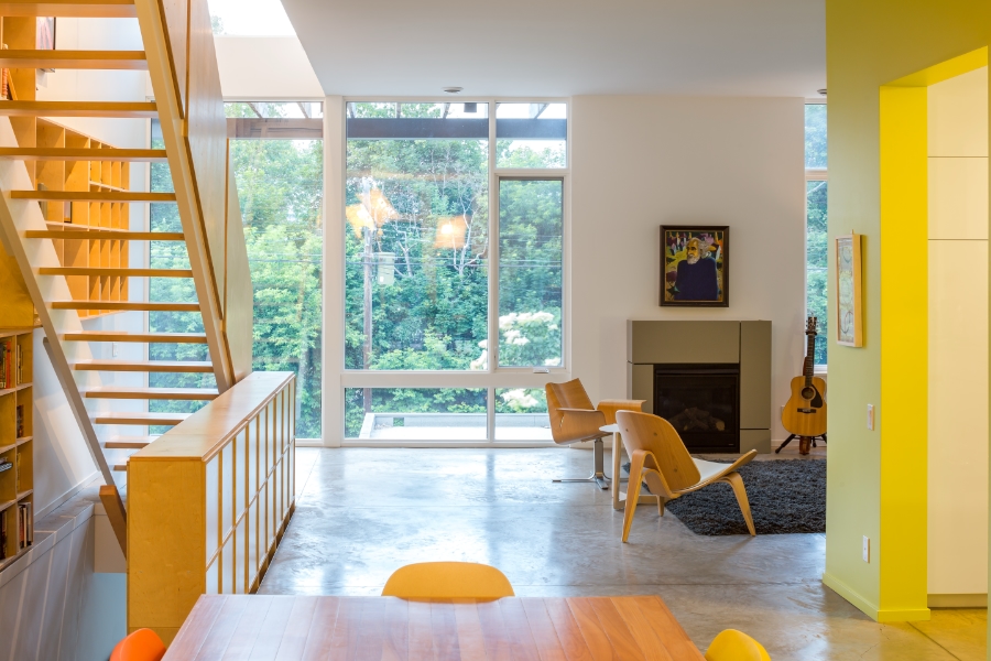John Donkin Architect - Dining table, staircase, living room, fireplace, wall of windows